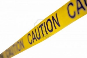 16485008 caution yellow tape isolated on white