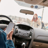 distracted driver about to hit pedestrian
