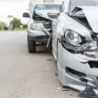 damaged vehicles after car crash
