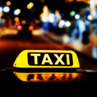 taxi sign at night