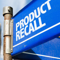 a street sign reading product recall