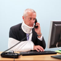 man calls workers’ compensation attorney after workplace injury